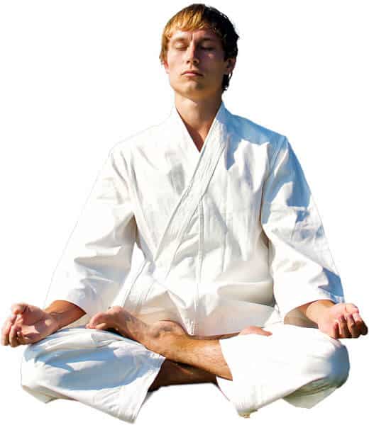Martial Arts Lessons for Adults in Waco TX - Young Man Thinking and Meditating in White