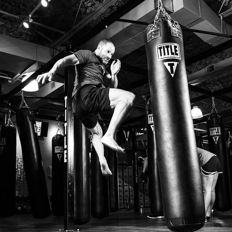 Mixed Martial Arts Lessons for Adults in Waco TX - Flying Knee Black and White MMA